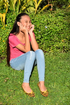 A Youthful Filipina Female And Happiness