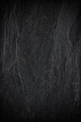 Dark grey black slate background or texture. black stone © peekeedee