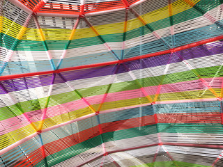 close-up of a multi colored chair made of plastic wire 2