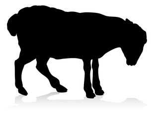A farm animal silhouette of a sheep or lamb