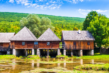 Croatia, countryside in region of Lika, Majerovo vrilo river source of Gacka, traditional village, old wooden mills and cottages
