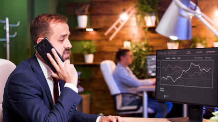Businessman talking on the phone in a modern office