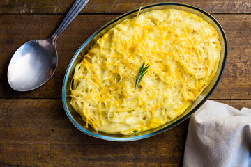 Pasta dish with creamy cheese sauce with meat overhead view
