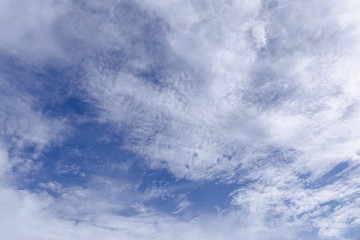 Blue sky and white clouds, rain clouds on sunny summer or spring day.