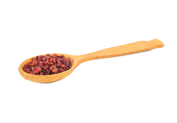 Dry barberry in spoon