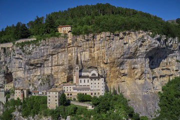 Fototapeta na wymiar Panorama view of Madonna della Corona, Italy. Flight by a drone. Popular travel destination in Nothern Italy.