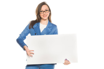 Naklejka premium Young smiling business woman holding empty board on white background