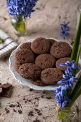 Chocolate biscuit. Crispy and crumbly delicious cookies with natural ingredients: flour, nuts, seeds, pieces of chocolate, cocoa, fruit jams.