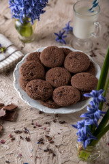 Chocolate biscuit. Crispy and crumbly delicious cookies with natural ingredients: flour, nuts, seeds, pieces of chocolate, cocoa, fruit jams.