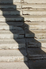 The shadow from the pillar on the stairs. Abstract background