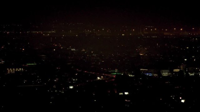 Fireworks launching and exploding in Berkeley and Oakland neighborhood streets on the Fourth of July