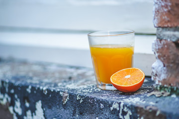 Still Life Glass of Fresh Orange Juice on the rock