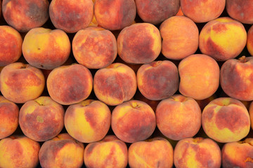 organic and fresh peaches at the market