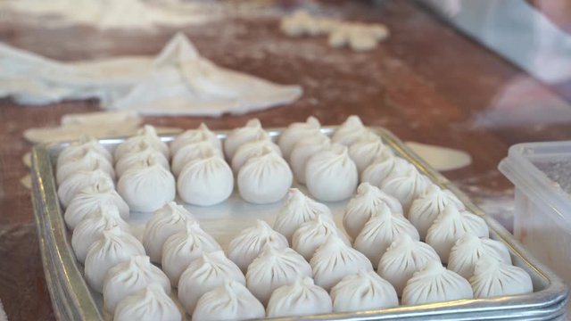 Cooking Video Steps to make Xiao long bao.It is the most popular Chinese dim sum dishes. Xiao long bao is made from bread flour mixed with wheat flour with minced pork filled with broth in the water.
