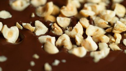 Detail of crushed hazelnuts in hot chocolate