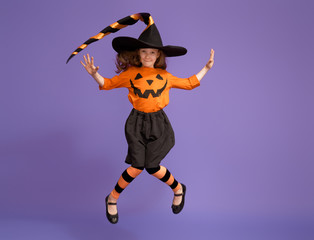 little witch on purple background