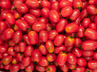 Fresh cherry tomatoes background