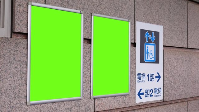 Motion Of Two Green Billboards And Direction Sign On Wall At Taipei Main Station With 4k Resolution