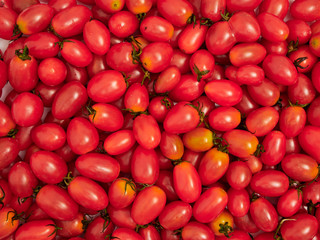Fresh cherry tomatoes background