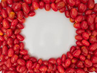 Fresh cherry tomatoes on white background