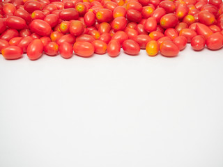 Fresh cherry tomatoes on white background