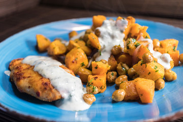 fresh meal with chicken chickpeas and sweetpotatoes