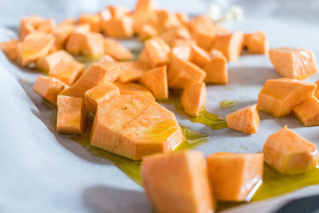 focus on sweet potatoes with some oil on it