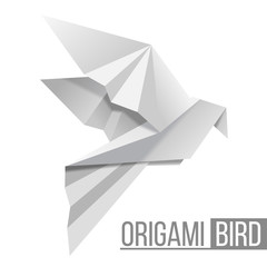 Origami paper bird. Flying pigeon isolated on white