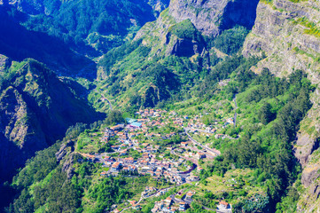 View from Eira do Serrado to Curral das Freiras village in the Nuns Valley in beautiful mountain...