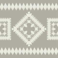 Fototapeta premium Ethnic boho seamless pattern. Ikat. Traditional ornament. Geometric background. Folk motif. Can be used for wallpaper, textile, invitation card, wrapping, web page background.