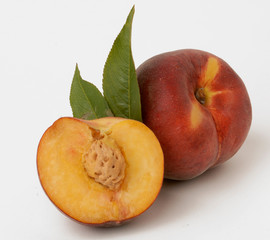 whole and cut peach