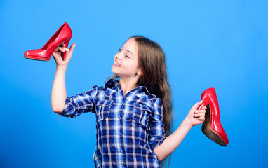 Shoes shop. Happy childhood. Glamour high heels. Awesome red stiletto shoes. Little fashionista kid...