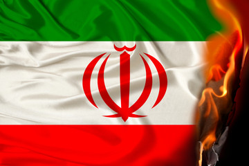 orange flames and ashes on a colored burning national flag of the state, concept of danger,...