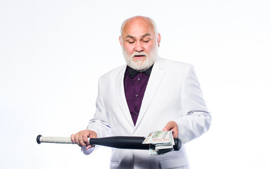 Money profit. Personal security. Successful businessman. Brutal business life. Racket and raiding. Kingpin concept. Black cash money. Senior man hold cash money and baseball bat. Richness wellbeing