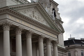 Fototapeta na wymiar Karlskirche Church In Vienna Austria On Dramatic Cloudy Day