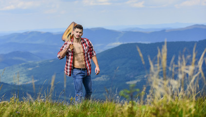 Carefree wanderer. Discover sounds of nature. Musician hiker find inspiration in mountains. Peaceful hiker. Conquer the peaks. Man hiker with guitar walking on mountain. Guy hiker enjoy pure nature