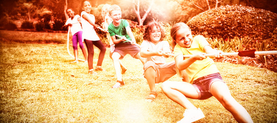 Children pulling rope in tug of war