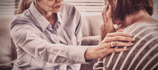 Therapist comforting patient