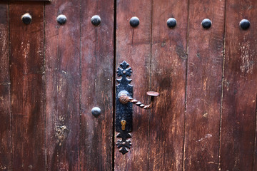 Vintage handle on a wooden door