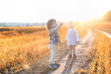 Children outdoors in a field