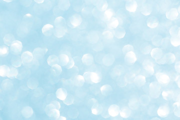 Abstract blue glitter background. Sparkle blue bokeh christmas or winter background.
