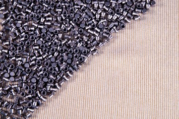 selection of pellets of an Air rifle. Close up. gun control background. Concept of shooting, close-up. pneumatic weapon, Air rifle parts and copy space. 