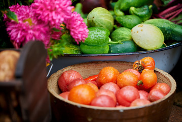 Decoratively arranged vegetables tomatoes, peppers, potatoes at the village festival