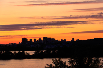 Fototapeta na wymiar Sunset over the Dnieper river in Kiev, Ukraine