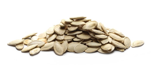 Salted pumpkin seeds isolated on white background