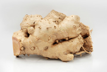 Black ginger root isolated on white background