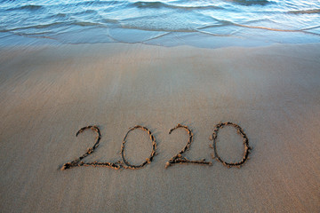 New Year 2020 is coming concept on tropical beach.