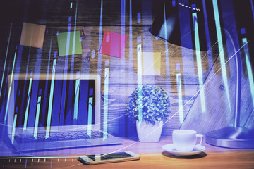 Double exposure of graph and financial info and work space with computer background. Concept of...