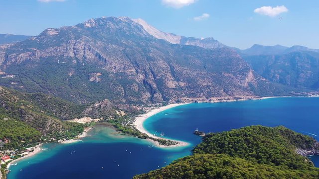 &Ouml;l&uuml;deniz is a resort village on the southwest coast of Turkey. It&rsquo;s known for the blue lagoon of &Ouml;l&uuml;deniz Tabiat Parki and the wide, white Belcekiz Beach. 