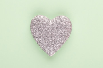 Christmas decor. Christmas decorations on pastel background. Flat lay, top view, copy space.